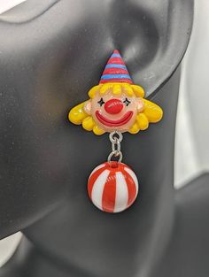 Red clown earrings, clown jewellery, clown lover gifts, novelty earrings, stud earrings, fun earrings, circus earrings, circus themed, Materials * 40mm red dangly clown charm * Sterling silver studs * light weight * rubber stoppers for back of earrings We purchase high quality materials through u.k. based business and also through china Postage * All UK items are sent standard royal mail unless tracking is choose at check out * All abroad items are sent standard delivery unless tracked is choose Fun Red Round Jewelry, Playful Red Drop Earrings, Playful Red Dangle Jewelry, Playful Nickel-free Red Earrings, Playful Red Pierced Earrings, Playful Handmade Red Earrings, Playful Red Earrings For Pierced Ears, Red Novelty Jewelry For Birthday, Playful Red Jewelry For Birthday