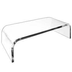 a glass table with a metal frame on it's legs and bottom part in the shape of a rectangle