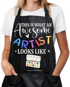 a woman wearing an apron that says, this is what an awesome artist looks like