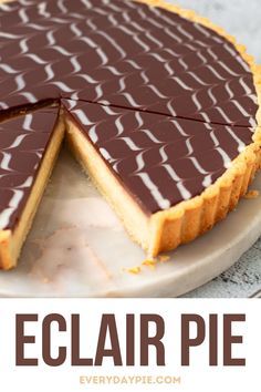 a chocolate tart pie with the words eclair pie on top and bottom