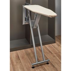 an ironing board on top of a metal stand