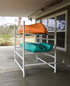 there are two kayaks that are on the rack