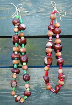 two necklaces made out of wood beads