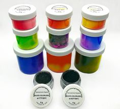 six different colors of dye in small containers