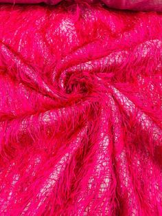 the pink fabric is very soft and bright, it looks like something out of an abstract painting