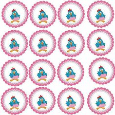 blue and pink cupcake toppers with cartoon characters on them