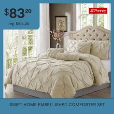 an advertisement for a comforter set with the price tag $ 8 29 reg $ 40 00