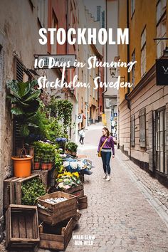 a woman walking down an alley way in stockholm, sweden with text overlaying the image