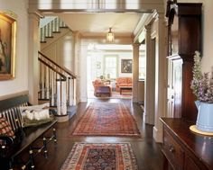 the hallway is clean and ready for us to use as an entrance way in this home