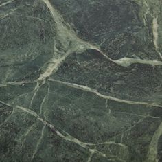 green marble textured with white vein lines