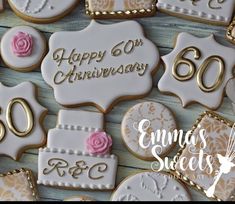 decorated cookies with the words happy 60th anniversary on them