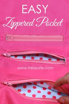 the zippered pocket is pink and has white polka dots on it, as well as red