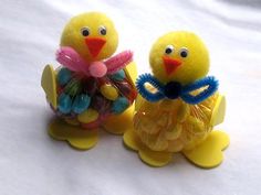 two yellow plastic chicks sitting next to each other