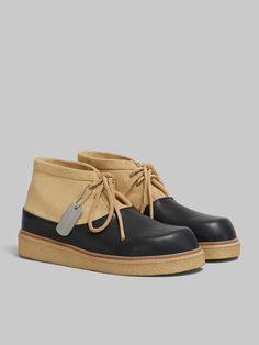 Ultra-lightweight lace-up desert boot, featuring a tumbled leather sabot toe and suede leather ankle. Leather lining. Soft leather insole. Light para rubber wedge sole. Marni Sneakers, Half Awake, Rubber Sole Boots, Heel Accessories, Desert Boot, Trunk Bag, Black And Beige, Black Sand, Desert Boots