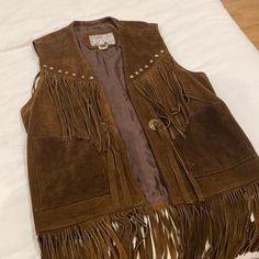 Amazing Vintage Fringe Vest! Heavy Leather/Suede, High Quality In Great Condition. Fits Like A Small. Brown Fringe Vest Outfit, Brown Fringe Vest For Festival, Bohemian Brown Fringe Vest, Brown Bohemian Vest With Fringe, Suede Fringe Vest, Vintage Fringe, Fringe Vest, Vintage Suede, Suede Fringe