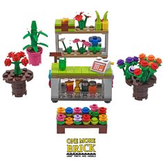 the lego flower shop is set up with flowers and potted plants