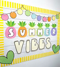 a bulletin board with the words summer vibes written in large letters and fruit on it