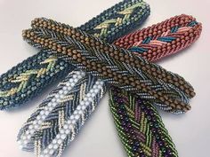 beaded bracelets are arranged on top of each other