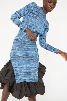 A long sleeve maxi dress in a wide rib knit fabric. Features a crew neck, two patch pockets in front, and a unique ruffled trim at the bottom. Rib Knit Dress, Denim Short Jumpsuit, Icon Clothing, Identity Project, Icon Shoes, Rib Knit Fabric, Iconic Dresses, Ribbed Knit Dress, Sleeve Maxi Dress