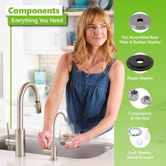 a woman is washing her hands in the kitchen sink while holding a glass with water