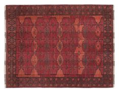 an antique rug with red and orange colors on the ground, including two rows of diamonds