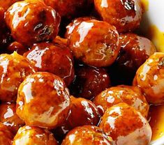 sweet and spicy chinese meatballs in a white bowl