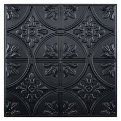 an ornate black tin ceiling tile