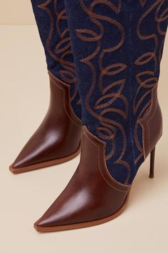 From mini skirts to denim on denim, there's no 'fit that the Steve Madden Tyrant Denim Multi Leather Knee-High High Heel Western Boots doesn't elevate! Dark wash denim and dark brown genuine leather come together to shape a pointed-toe upper and a seamed vamp that leads to a 13.5"" knee-high shaft with a 15"" circumference. The slip-on design boasts light brown Western-inspired embroidery and studded pull tabs at the curved topline. A sky-high stiletto heel completes the show-stopping look! 4" w Knee High Western Boots, Denim On Denim, Heel Boots, Dark Wash Denim, Sky High, Western Boots, Stiletto Heel, Light Brown, High Heel