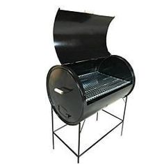 an outdoor bbq grill with the door open