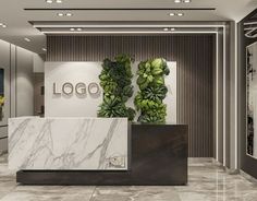 a marble counter top sitting in front of a white and black wall mounted planter