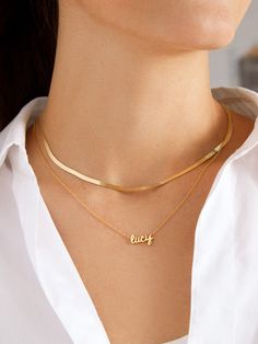 Spell it out with the 18K Gold Mini Nameplate Necklace. This custom name piece features a modern gold chain attached to your choice of a pavé or gold nameplate. Featuring the personalization of your choosing. Crafted with 18K gold plated sterling silver and Cubic Zirconia stones, you'll be wearing it for years to come. Nameplate Necklace, Gold Plated Sterling Silver, Name Plate, Name Necklace, Custom Items, Custom Name, Gold Chain, Customized Gifts, Gold Chains