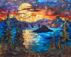 a stained glass window with an image of a mountain lake and moon in the sky