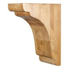 a wooden shelf with a curved design on the top and bottom section, made out of wood