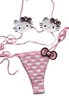 two hello kitty bikinis are shown with bows on the bottom and one is pink