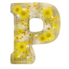 the letter p is made up of yellow flowers and glass letters are painted with acrylic paint