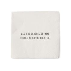 a napkin that says, age and glasses of wine should never be counter - tested