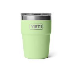 the yeti cup is shown in light green