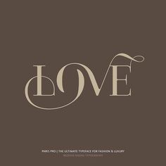 the word love is written in brown and white on a dark background with an ornate font