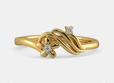 a gold ring with two diamonds on the top and an intertwined design in the middle