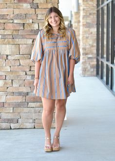 This dress had a 3/4 length sleeve and stripe detailing. Mckenzie is wearing a medium. Beige 3/4 Sleeve Dress For Day Out, Serena Dress, Tender Moments, Textured Dress, White Maxi, White Maxi Dresses, Dress Romper, Cardigan Jacket, Holiday Dresses