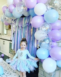 "Let it Snow!! Beautiful Frozen theme Fringe Backdrop.  Perfect for your little princesses Party!   Handmade from premium plastic tablecloth. Each streamer is individually cut and tied to Jute twine.   Colors: white, lavender, baby blue, iridescent tinsel and silver metallic If you like this look but want different colors, please let me know in the Personalization box at checkout. Size: Streamer to streamer 48\" Length varies from 6\"-49\" Extra twine for easy hanging  This is lightweight and can be used indoors and outdoors.  It is reusable.   Recommendation for best hanging is using command hooks.  Make sure you take out of bag as soon as you receive it.  Best way I found to store it, is to drape over a hanger and hang it up.  Follow me at Back Fringe Designs on IG on more details.  This Let It Go Birthday Party, Elsa Frozen Theme Party, Frozen Birthday Party Backdrop Ideas, Elsa Frozen Party Decorations, Frozen Birthday Party Decorations Ideas At Home, Elsa Birthday Party Decorations At Home, Frozen Decorations Party, Elsa Table Decorations, Frozen Birthday Party Simple