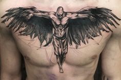 a man's chest with an angel tattoo on his chest and the cross behind him