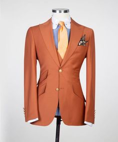 a mannequin wearing an orange suit and tie