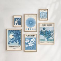 six framed art pieces with blue flowers on them