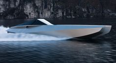 a white and black speed boat in the water near some cliffs on a mountain side