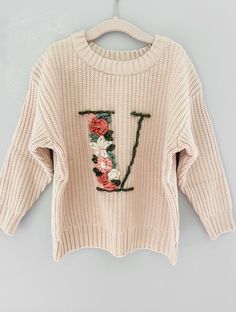 Fall Floral Applique Crew Neck Sweater, Cute Letter Embroidery Sweater For Fall, Cute Sweater With Letter Embroidery For Fall, Crew Neck Sweater With Custom Embroidery For Spring, Cream Long Sleeve Sweater With Letter Embroidery, Pink Sweater With Custom Embroidery For Fall, Crochet Monogram, Initial Sweater, Birthday Sweater