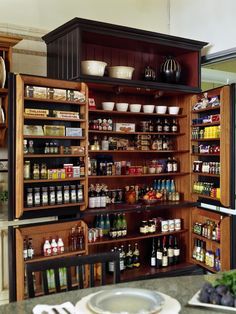 an open pantry with lots of food in it