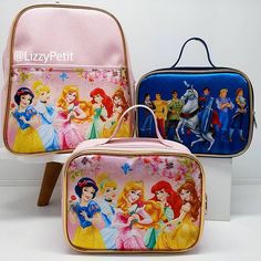 three children's lunch bags with princesses on them