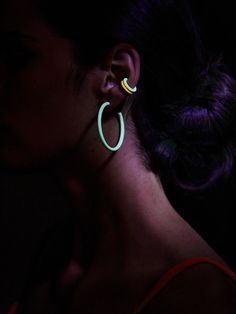 Light up your look with the You Glow Girl Ear Cuff Set. This set features three individual ear cuffs, each in a vibrant Halloween-themed color. Plus, they're made with glow-in-the-dark enamel, so you'll be sure to get compliments well into the night. During the day, leave them in the sun or strong indoor lighting to guarantee a statement at night. Dark Earrings, Skeleton Necklace, Halloween Clips, Witch Earrings, Ghost Earrings, Light Earrings, Halloween Charms, Halloween Earrings, Ear Cuffs