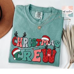 Christmas Crew 2024 Comfort Colors Shirt, Christmas Crew Tshirt, Christmas Party Shirt, Family Matching Christmas Shirt 2024, Holiday Shirts, Christmas Gift ❤ Comfort Colors® Brand Shirts & Unisex Adult Sizing The softly washed, garment-dyed fabric adds extra comfort to your wardrobe, and its relaxed fit makes it a great everyday choice. The shirt's double-needle stitching enhances its durability, and the absence of side seams helps it maintain its tubular shape. ❤ Please note that the rolled sleeves in our photos are for styling inspiration only, and any props shown are not included with your purchase. ❤ PRINT Our shirts are printed using Direct-To-Garment technology, ensuring durability without the risk of cracking or peeling. The ink becomes part of the fabric, providing a seamless and Holiday Tshirts Ideas, Christmas Tshirt Ideas Family, Christmas Crew Shirts, Christmas Tshirt Designs, Holiday Retail, Christmas Party Shirt, Family Matching Christmas, Christmas Tee Shirts, Matching Christmas Shirts